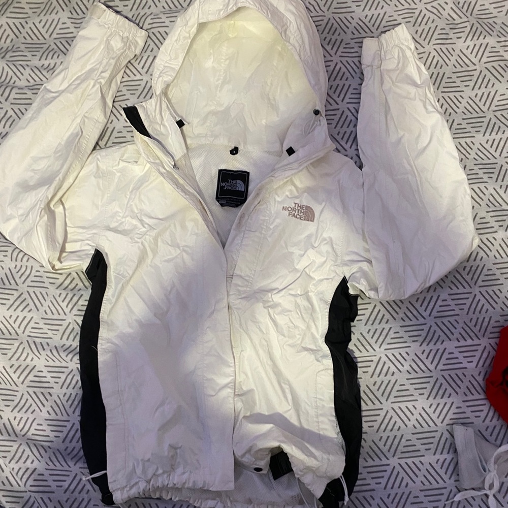 White& black The North Face wind breaker
